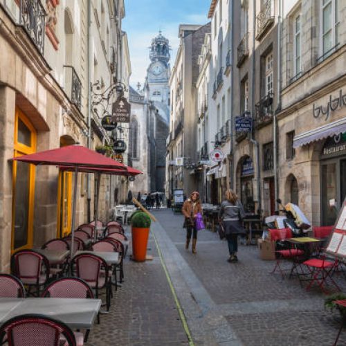 Nantes, France - September 25, 2018: detail of architecture and street atmosphere in the streets of the historic city center on a summer day